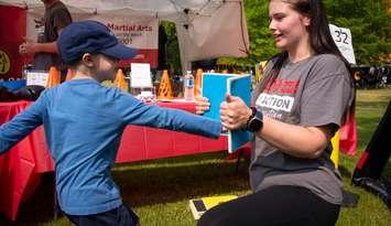 A child participates in a martial arts activity at Kids Funfest. Image courtesy of the City of Sarnia.