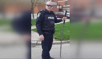 Sarnia Police sgt. Jim McCabe holding a sword seized from a man in the city. May 6, 2019. (Photo by Sarnia Police)