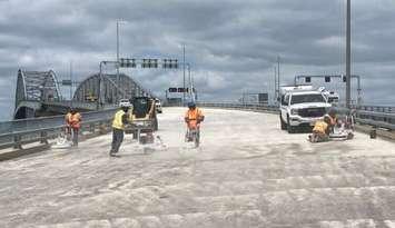 Contractors grinding the deck of the Blue Water Bridge. August 2024. Photo by the Federal Bridge Corporation. Submitted.