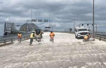 Contractors grinding the deck of the Blue Water Bridge. August 2024. Photo by the Federal Bridge Corporation. Submitted.