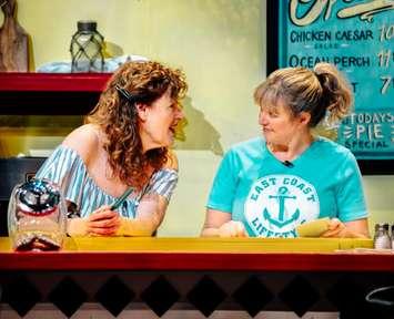 'Halfway There'. L to R: Holly Wenning as Rita, Mandy Davidson as Janine. Image courtesy of Theatre Sarnia.