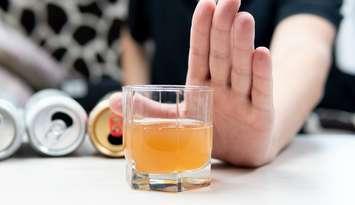 Man refuses alcohol drink. © Can Stock Photo / darksoul72