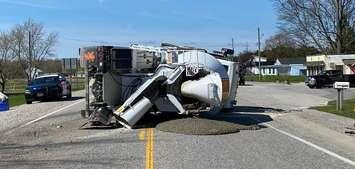 A cement truck on its side after a two-vehicle crash on Talbot Line in Bayham, April 25, 2024. Photo provided by Elgin OPP.