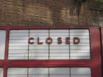 Old style 'closed' signage on a cinema.© Can Stock Photo / cygnusX