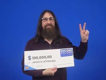 Jamie Gale of Petrolia wins a $100,000 ENCORE prize - Jan 11/23 (Photo courtesy of OLG)