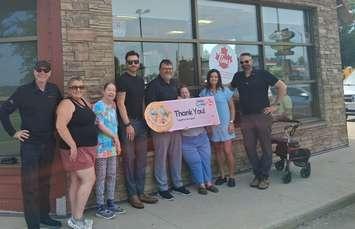 Lambton County Developmental Services receives donation from 2025 Smile Cookie campaign. July 2025. (Photo courtesy of LCDS via Facebook)