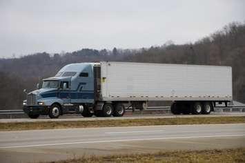 Transport truck on highway (Image courtesy of Can Stock)