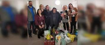 JMX Contracting INC. makes a donation to the Women’s Interval Home of Sarnia Lambton. 

(From left to right) Marco Vozza, Angie Marks, Nancy Metcalfe, Baylee Brooks, Tracy Leblond, Lindsay Thomas, and Michelle Walsh. December 2019. (Photo provided by JMX)