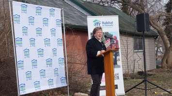 Habitat for Humanity Sarnia-Lambton Executive Director Sarah Reaume speaks at a ceremonial ground breaking for two homes to be built at 774 Devine St. April 13, 2016 (BlackburnNews.com Photo by Briana Carnegie)