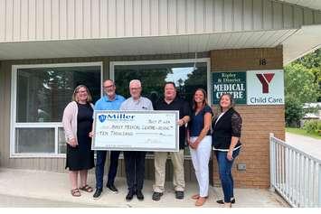 Accepting the cheque on behalf of the Township of Huron-Kinloss are Director of Community Services Mike Fair and Manager of Strategic Initiatives Michelle Goetz. Presenting the cheque from Miller Insurance was Todd Farrell, Amanda Farrell Walsh, Dave Young and Laura Lambert (Photo provided by the Township of Huron-Kinloss)