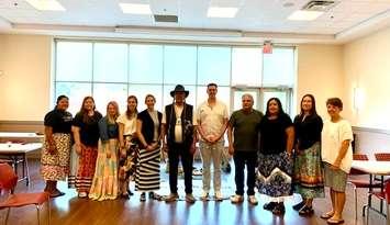Michaella Sarazin, Michaela Nahmabin-Hiltz, Amy Weiler, Julie Harries, Nadine Neve, Richard Assinewai, Joe Antone, Doug George, Sara Plain, Paige Boris, Paula Reaume-Zimmer at the naming ceremony for E-nangaabe-jig Health Services (Photo by: Sarnia-Lambton Ontario Health Team)