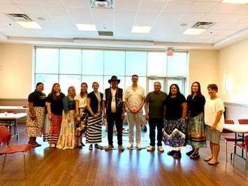 Michaella Sarazin, Michaela Nahmabin-Hiltz, Amy Weiler, Julie Harries, Nadine Neve, Richard Assinewai, Joe Antone, Doug George, Sara Plain, Paige Boris, Paula Reaume-Zimmer at the naming ceremony for E-nangaabe-jig Health Services (Photo by: Sarnia-Lambton Ontario Health Team)