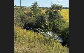 An SUV hauling a boat crashes into the ditch on Highway 402 at Forest Road - Sept. 9/25 (Photo Courtesy of OPP)