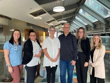 Local philanthropists Anne West and Jeff Burchill (middle) with Bluewater Health's Sexual Assault and Domestic Violence Treatment Centre staff. May 2024. (Photo courtesy of the Bluewater Health Foundation)