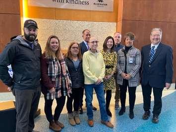A Bluewater Health oncology patient and his family, along with NOVA, Bluewater Health, and Bluewater Health Foundation leaders - Mar 18/24 (Submitted Photo)
