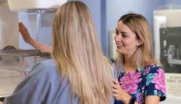 A Bluewater Health Imaging Department staff member conducts a mammogram breast screening of a patient. Submitted photo.