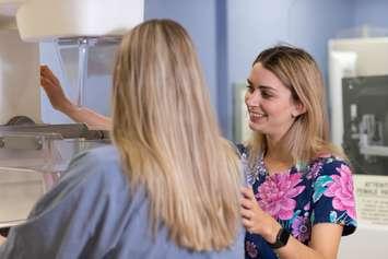 A Bluewater Health Imaging Department staff member conducts a mammogram breast screening of a patient. Submitted photo.