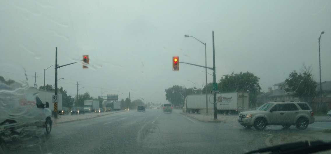 Vehicles driving in heavy rainfall. August 29, 2017. Photo by Mark Brown/Blackburn News.