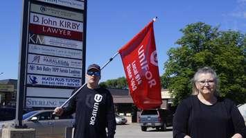 Sarnia-Lambton Health Coalition Chair Shirley Roebuck and Steve Clendenning with Unifor Local 914, taking part in a province-wide day of action to bring attention to Bill 175. 24 June 2020. (BlackburnNews.com photo by Colin Gowdy)