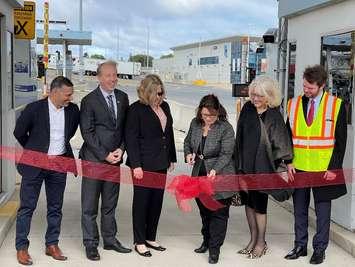 Representatives from the Sault St. Marie International Bridge, Michigan Department of Transportation, Blue Water Bridge, and The Federal Bridge Corporation Limited at a ribbon cutting in Point Edward, Ontario.  September 28, 2022. (Photo courtesy of FBCL)