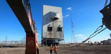 Heavy equipment prepares to pull down the Unit $4 absorber at LGS. Image captured from Delsan Aim video. Used with OPG permission. November, 2022.