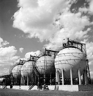 View of Horton Spheres storing butadiene and styrene, two chief ingredients of buna-S synthetic rubber at the Polymer Corporation plant. September 1944. (Photo by Ronny Jaques. National Film Board of Canada)
