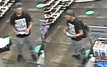 Video surveillance of person of interest believed to be connected to the fraudulent use of stolen credit cards.  July 2021.  (Screenshot of video provided by Sarnia Police Service)