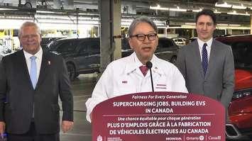 Honda Motors Ltd. President and CEO Toshihiro Mibe announces a new electric-vehicle investment for Honda Canada, as Premier Doug Ford and Prime Minister Justin Trudeau listen in Alliston, April 25, 2024. Screenshot courtesy Premier of Ontario/YouTube.