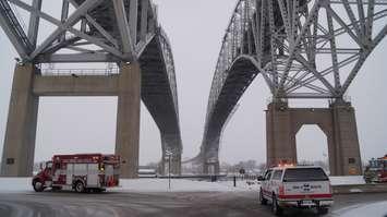 Pt. Edward Fire and Rescue, EMS and OPP investigate a person possibly jumping from the Blue Water Bridge. February 9, 2016 (BlackburnNews.com Photo by Briana Carnegie)