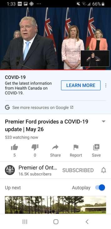Ontario Premier Doug Ford addresses the media on long-term care, as Minister of Long-Term Care Dr. Merrilee Fullerton and Minister of Health Christine Elliott look on, May 26, 2020. Image provided by Premier of Ontario/YouTube