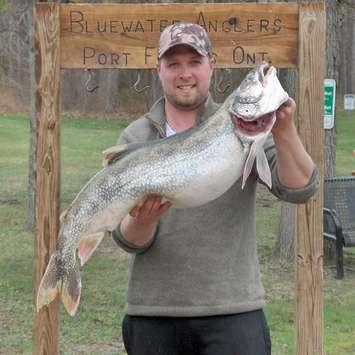 Justin Tadgell of Grand Bend with a 26.24 lb Lake Trout May 4, 2018 Photo submitted by the Bluewater Anglers. 