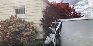 Vehicle hits house in Point Edward Oct. 2, 2020 (Photo via Point Edward Fire & Rescue Facebook page)