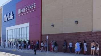 A line of shoppers outside the Marshalls-HomeSense in Sarnia on day one of Ontario’s three-phase reopening plan.  11 June 2021.  (BlackburnNews.com photo by Colin Gowdy)