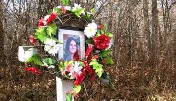 A roadside memorial marks where the body of 14-year-old Karen Caughlin was found in 1974. (Photo courtesy of OPP)