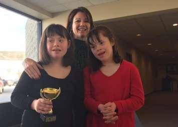 Amy Brand poses for a photo with her  twin 12-year-old girls. December 2, 2016 BlackburnNews.com photo by Melanie Irwin