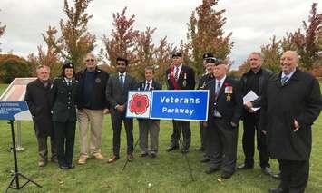Local veterans and dignitaries gather in Heritage Park for the Veterans Parkway sign unveiling ceremony. October 16, 2019. (Photo by City of Sarnia)