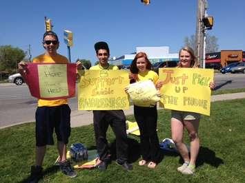 Students in Sarnia Lambton display signs raising awareness to teen suicide locally. BlackburnNews.com File Photo.