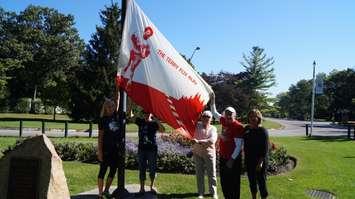 Organizers raise the Terry Fox banner at Canatara Park.  File photo by Jake Jeffrey (blackburnnews.com)