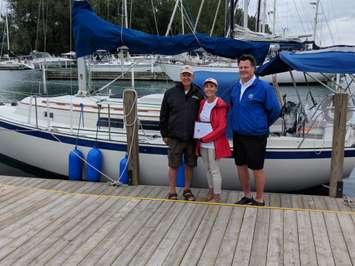 Steve Van Vlaenderen and his partner Darlene Hildebrand alongside Marina Operator Dave Brown. August 22, 2018. (Photo by Josh Boyce, BlackburnNews)