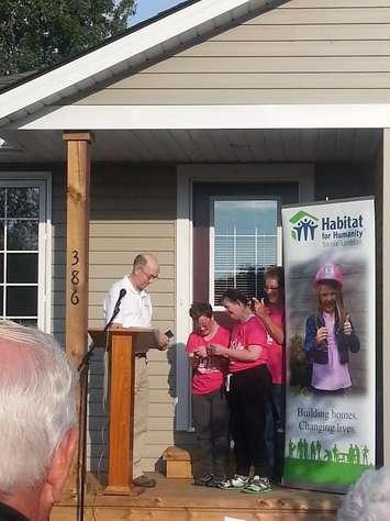 The keys are handed over to the owners of Habitat For Humanity's latest build in Petrolia Sept 17, 2014           

(Photo by Sarah Woodley)