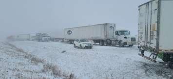 West Region OPP say as many as 50 vehicles were involved in collisions on Highway 402. December 23, 2022. OPP photo.