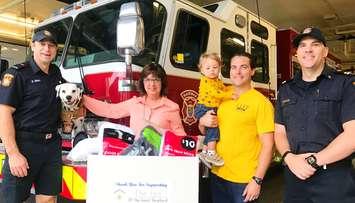 Sarnia Fire Rescue & The Inn of the Good Shepherd kicking off the "Sock it to Us" sock drive. September 25, 2018. (Photo from the Sarnia Fire Rescue facebook page)