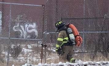 A firefighter at former Holmes Foundry site Feb 1, 2021 (Photo courtesy of Greg Grimes)