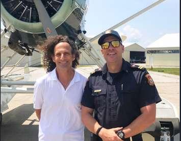 American saxophonist Kenny G with Sarnia Fire Public Education Officer Mike Otis at Chris Hadfield Airport. July 11, 2018 (Photo courtesy of @SarniaFire Twitter) 