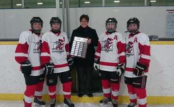LCCVI Senior Girls Hockey team celebrates a victory in the 'AA' Finals. (submitted photo)