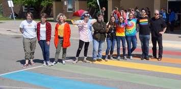 Northern High School's Gay Straight Alliance group stands on the school's rainbow walkway. June 6, 2019. (BlackburnNews photo by Colin Gowdy)