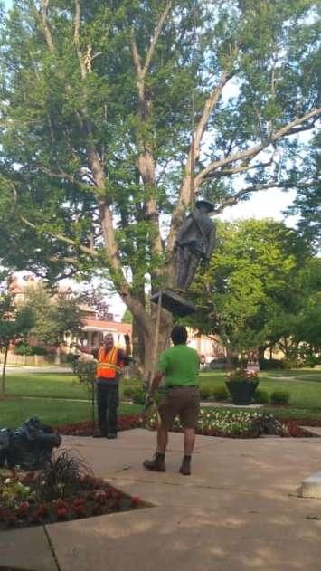 "Tommy the Soldier" statue is temporarily removed from the Sarnia Cenotaph to undergo repairs.  28 June 2021. (Photo by Sarnia Legion Branch 62)