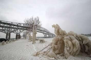 Strong winds and bitterly cold air coat the St. Clair River waterfront with ice Jan. 15, 2018 (BlackburnNews.com photo by Dave Dentinger)