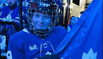 Aamjiwnaang's Madison Maness was the flag bearer at the Toronto Maple Leafs playoff game vs. Boston - Apr 24/24 (Photo courtesy of Stephanie Maness)