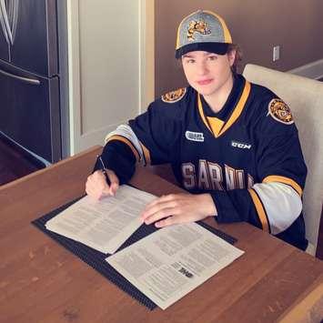 Max Namestnikov signing an Ontario Hockey League standard player agreement with the Sarnia Sting. April 2020. (Photo provided by Sarnia Sting Hockey Club)